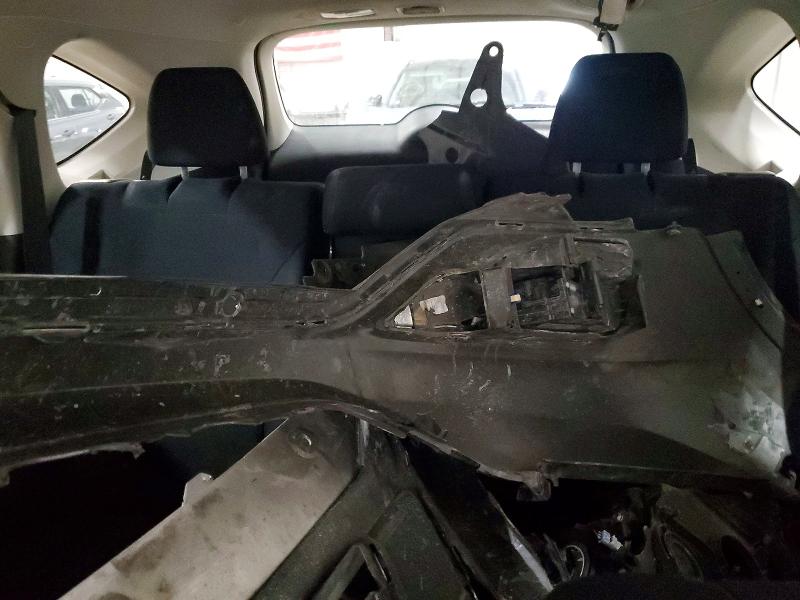 Photo 10 from auction – 2015 HONDA CR-V with VIN 3CZRM3H50FG705358