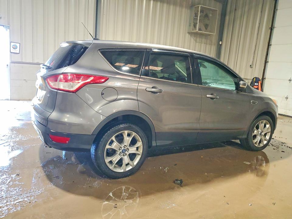 Photo 3 from auction – 2013 FORD ESCAPE with VIN 1FMCU9H97DUD78612