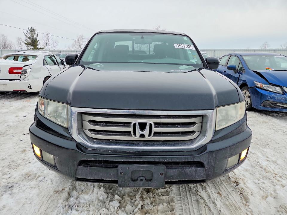 Photo 5 from auction – 2013 HONDA RIDGELINE with VIN 5FPYK1F53DB009862