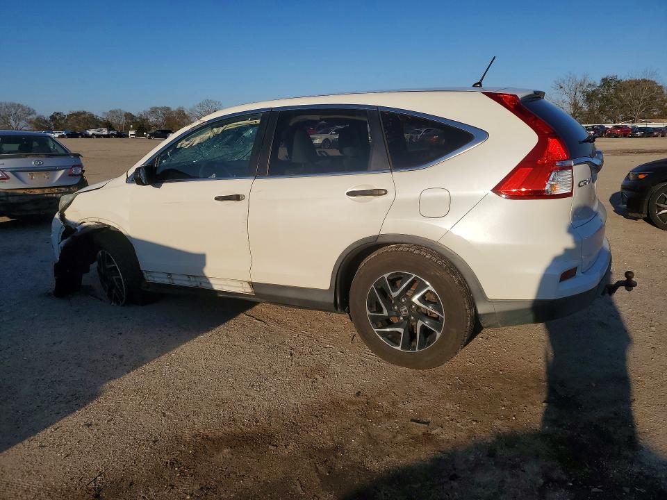 Photo 2 from auction – 2016 HONDA CR-V with VIN 5J6RM3H42GL011959