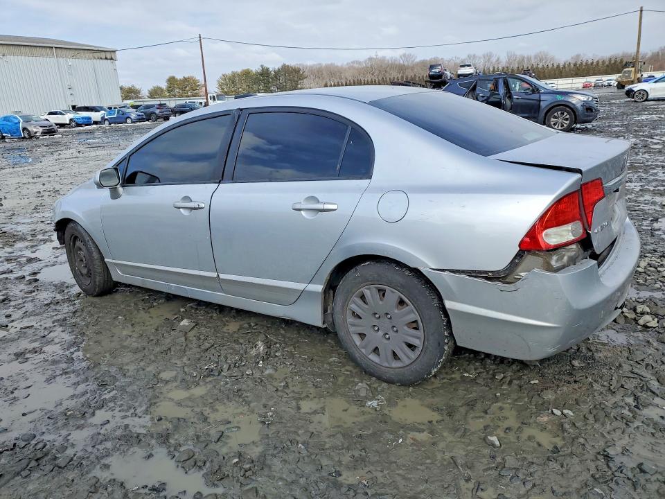 Photo 2 from auction – 2011 HONDA CIVIC with VIN 19XFA1F55BE018844