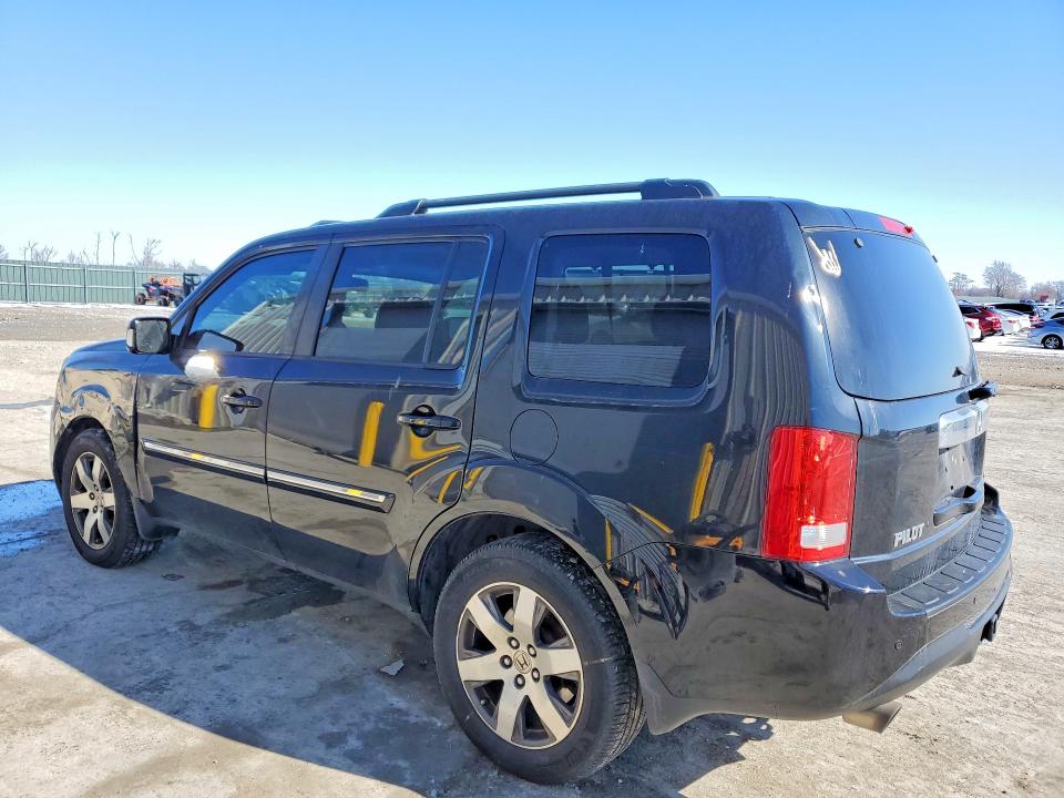 Photo 2 from auction – 2014 HONDA PILOT TOUR with VIN 5FNYF4H99EB053509