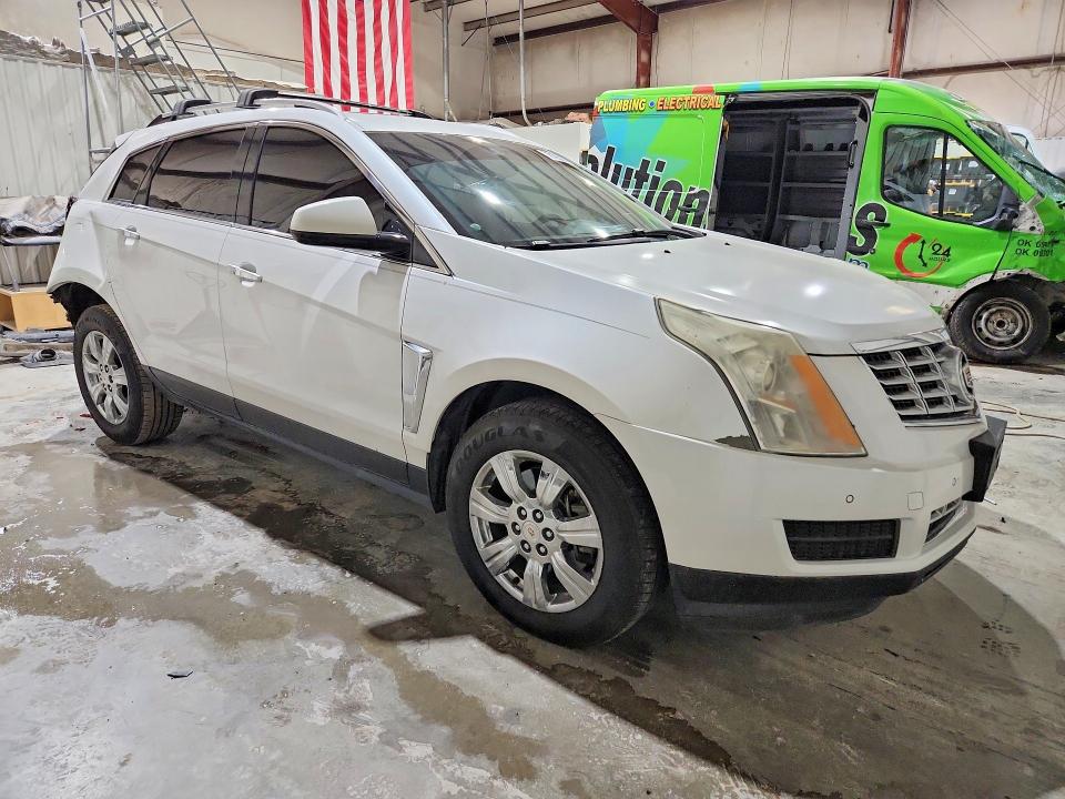 Photo 4 from auction – 2015 CADILLAC SRX with VIN 3GYFNBE33FS595688
