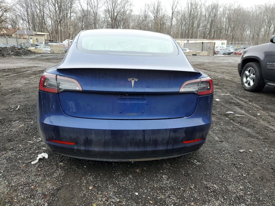 Photo 6 from auction – 2018 TESLA MODEL 3 with VIN 5YJ3E1EB4JF080842