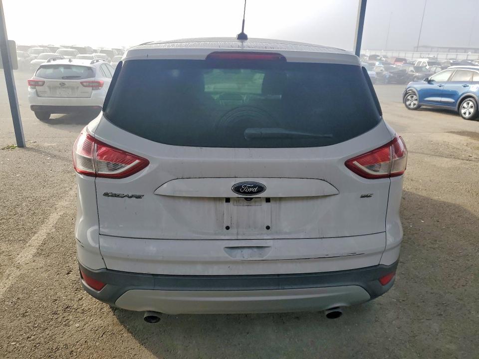 Photo 6 from auction – 2016 FORD ESCAPE with VIN 1FMCU0G79GUA70356