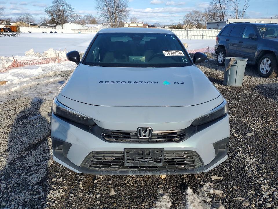 Photo 5 from auction – 2023 HONDA CIVIC SPOR with VIN 2HGFE2F58PH556932