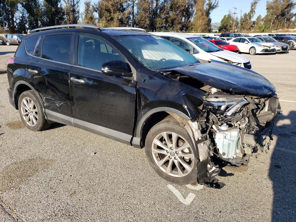 Photo 4 from auction – 2018 TOYOTA RAV4 with VIN 2T3YFREV1JW435777