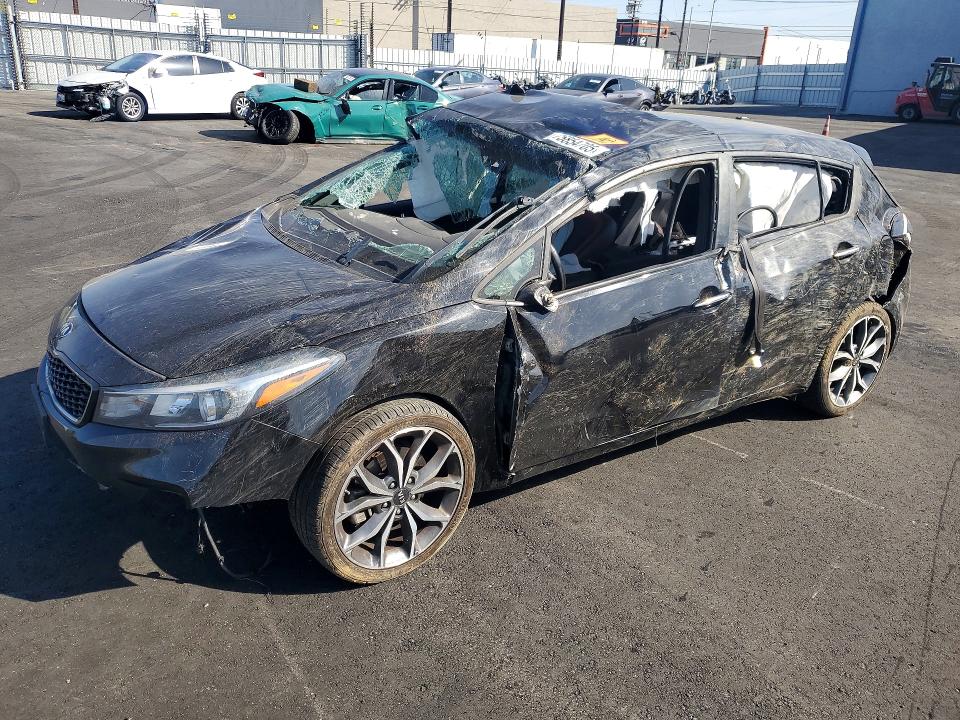 KIA FORTE EX 2018 with VIN 3KPFN5A34JE209364 - Photo from auction