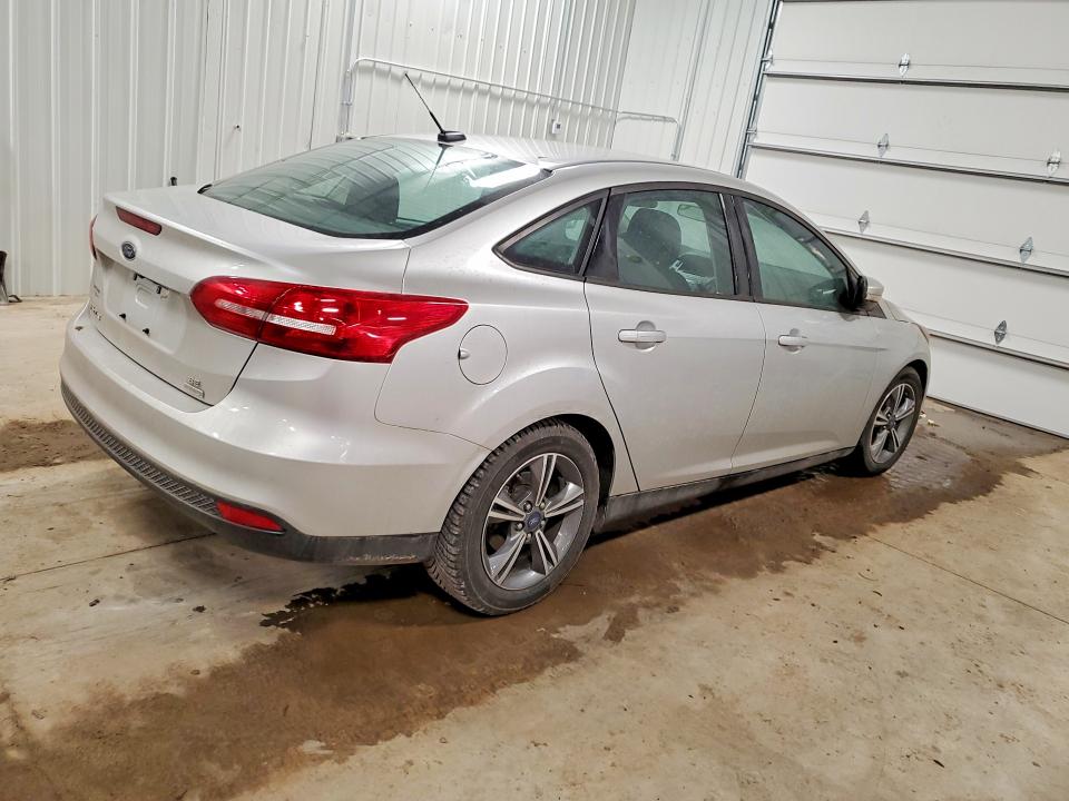 Photo 3 from auction – 2016 FORD FOCUS with VIN 1FADP3FE7GL395469