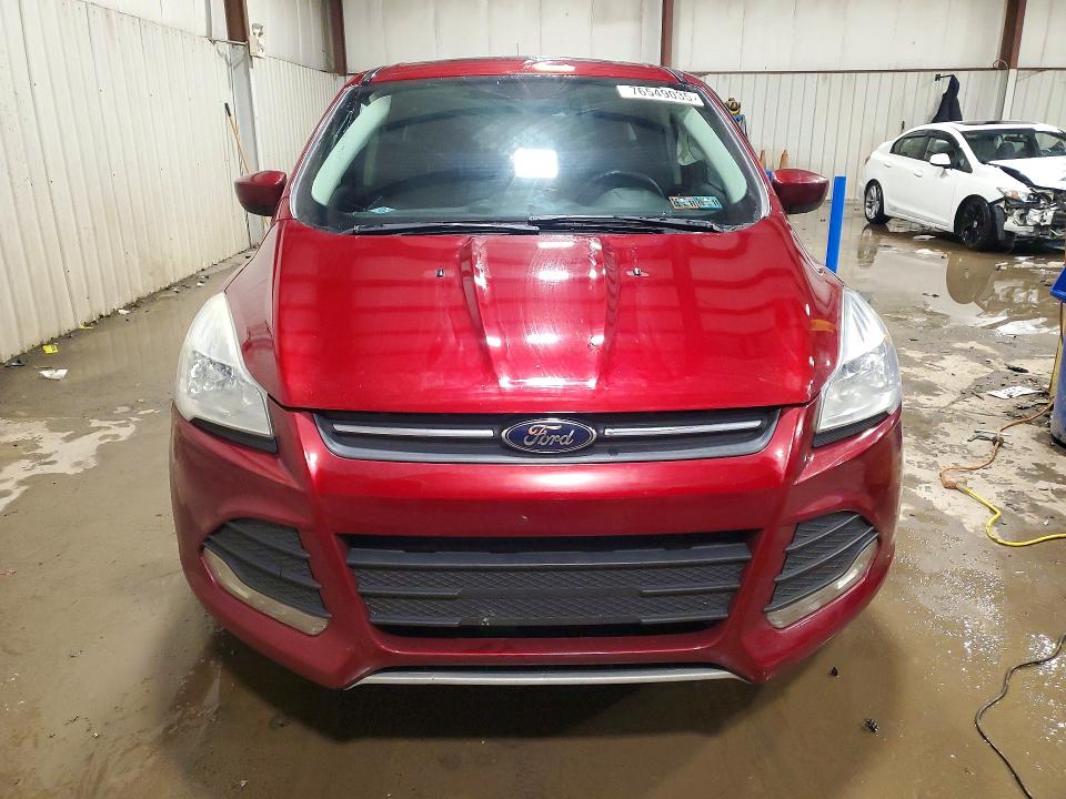 Photo 5 from auction – 2016 FORD ESCAPE with VIN 1FMCU9GX7GUB51294