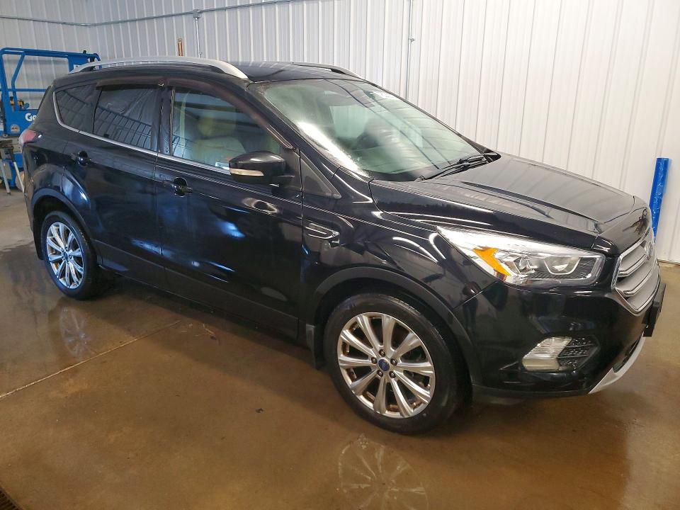 Photo 4 from auction – 2017 FORD ESCAPE TIT with VIN 1FMCU9J99HUA19147