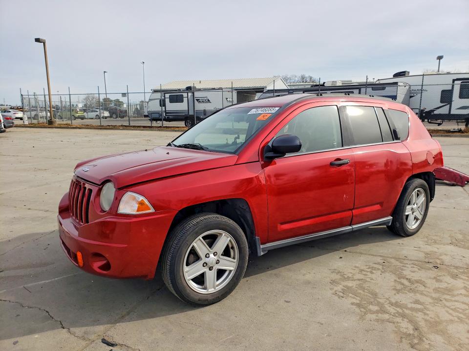 JEEP COMPASS 2007 with VIN 1J8FT47W67D371713 - Photo from auction