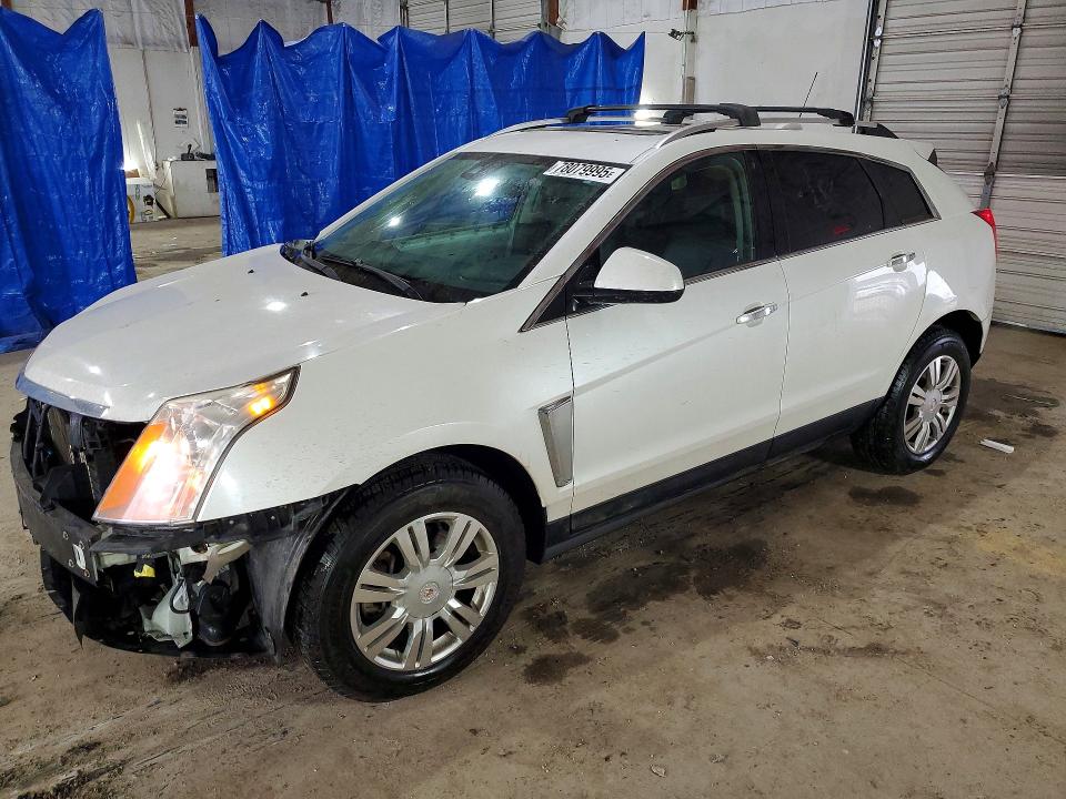 CADILLAC SRX 2015 with VIN 3GYFNBE38FS641371 - Photo from auction