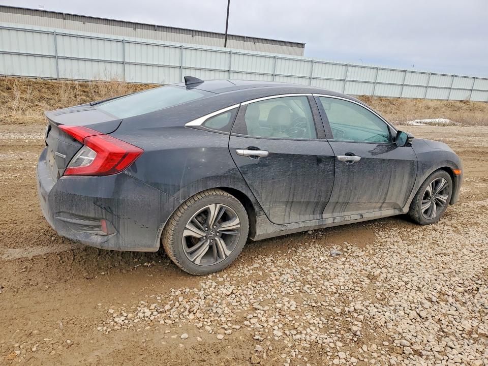 Photo 3 from auction – 2016 HONDA CIVIC TOUR with VIN 2HGFC1F98GH657391