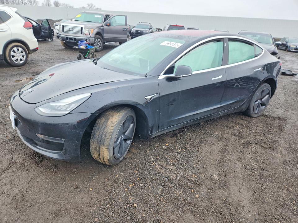 TESLA MODEL 3 2018 with VIN 5YJ3E1EA1JF166228 - Photo from auction