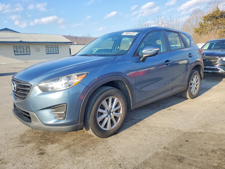 MAZDA CX-5 2016 with VIN JM3KE2BY3G0877530 - Photo from auction