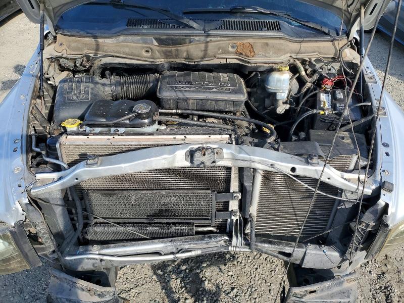 Photo 11 from auction – 2002 DODGE RAM 1500 with VIN 1B7HA18N62J102003