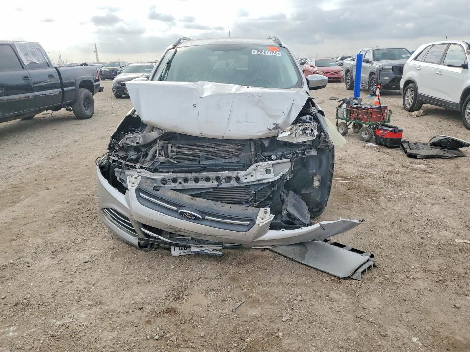 Photo 5 from auction – 2014 FORD ESCAPE with VIN 1FMCU0GX9EUD98597