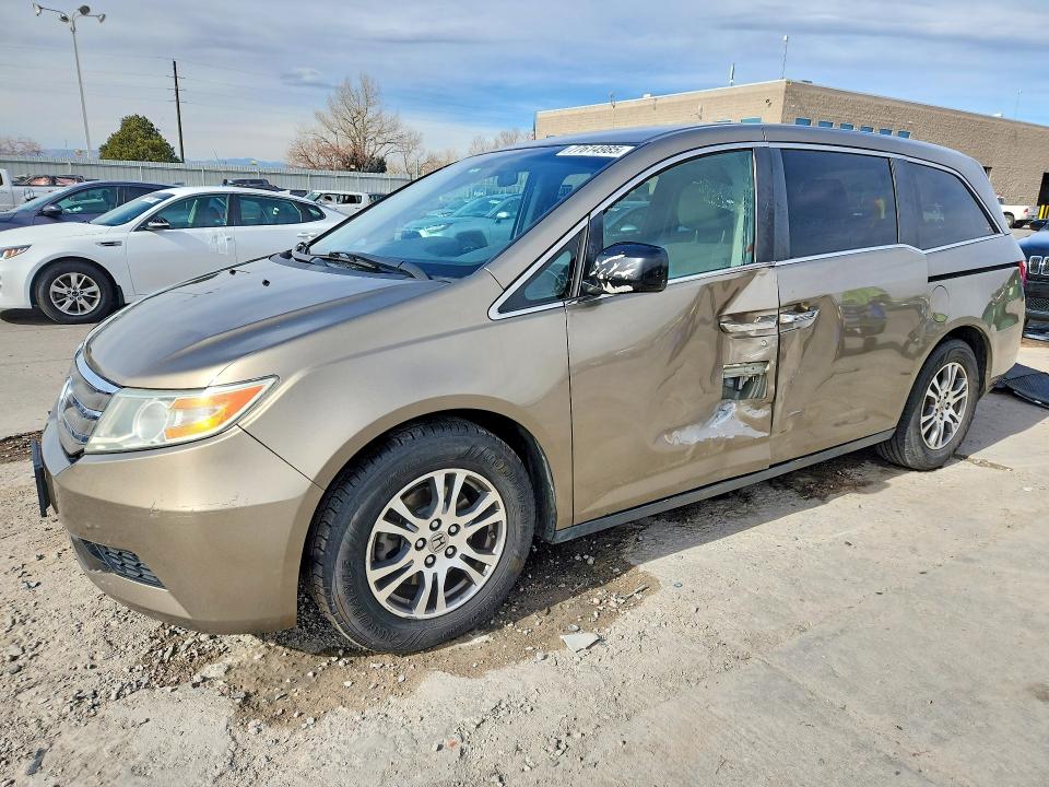 HONDA ODYSSEY 2012 with VIN 5FNRL5H4XCB052695 - Photo from auction