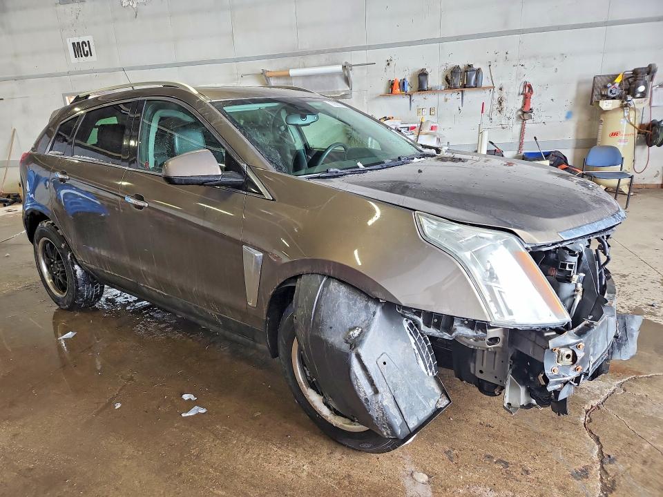 Photo 4 from auction – 2014 CADILLAC SRX LUXURY with VIN 3GYFNEE39ES676971