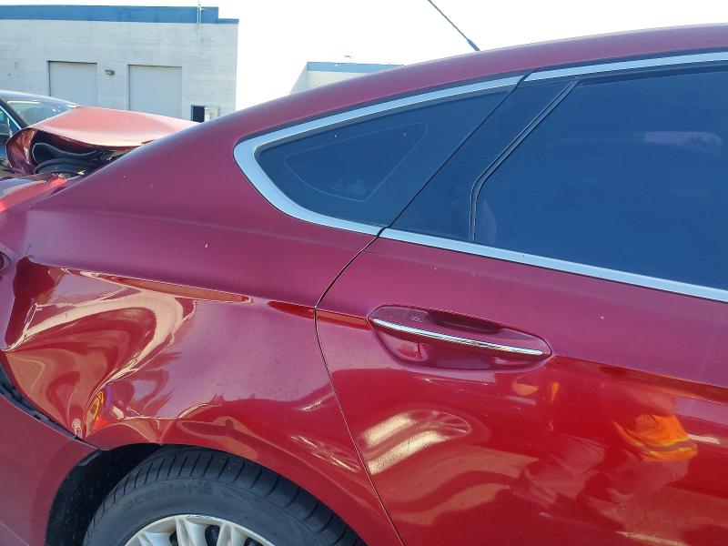Photo 12 from auction – 2014 FORD FUSION HYB with VIN 3FA6P0PU9ER317058