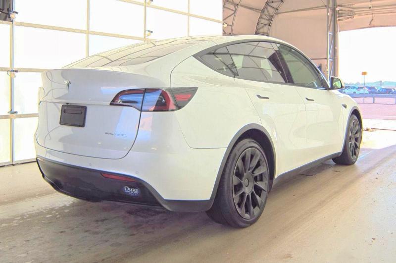 Photo 4 from auction – 2022 TESLA MODEL Y with VIN 7SAYGDEE9NF332623