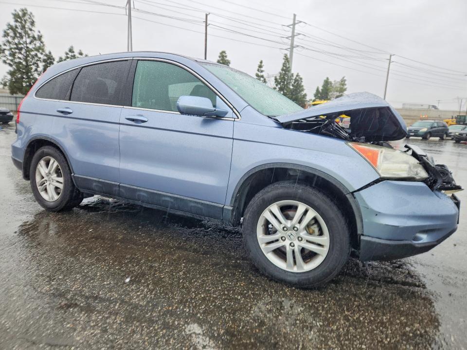 Photo 4 from auction – 2011 HONDA CR-V with VIN 5J6RE3H70BL056656