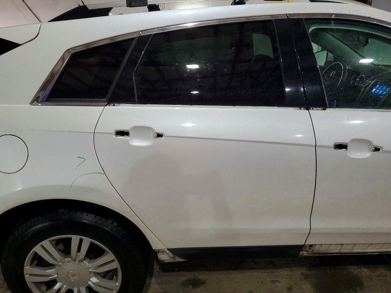 Photo 11 from auction – 2015 CADILLAC SRX with VIN 3GYFNBE38FS641371