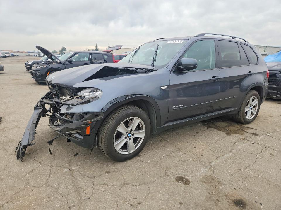BMW X5 2012 with VIN 5UXZW0C56CL668044 - Photo from auction