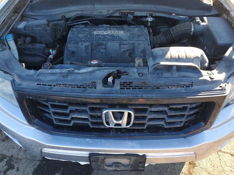 Photo 11 from auction – 2014 HONDA RIDGELINE with VIN 5FPYK1F68EB012976