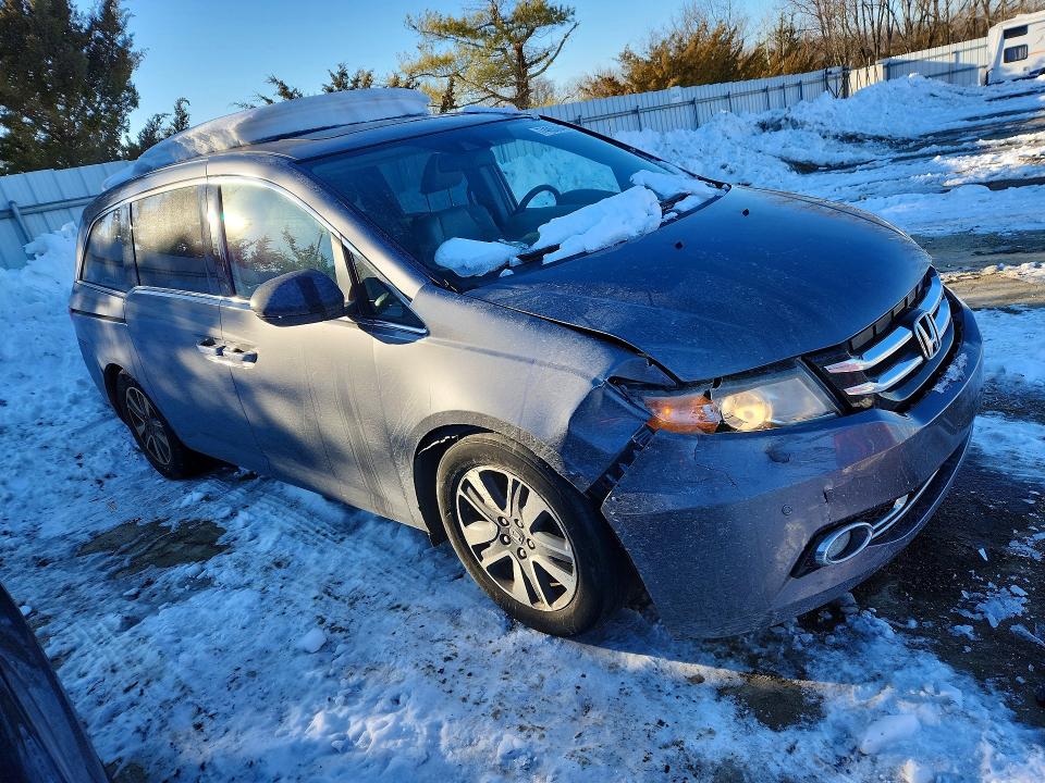 Photo 4 from auction – 2014 HONDA ODYSSEY TO with VIN 5FNRL5H96EB022480