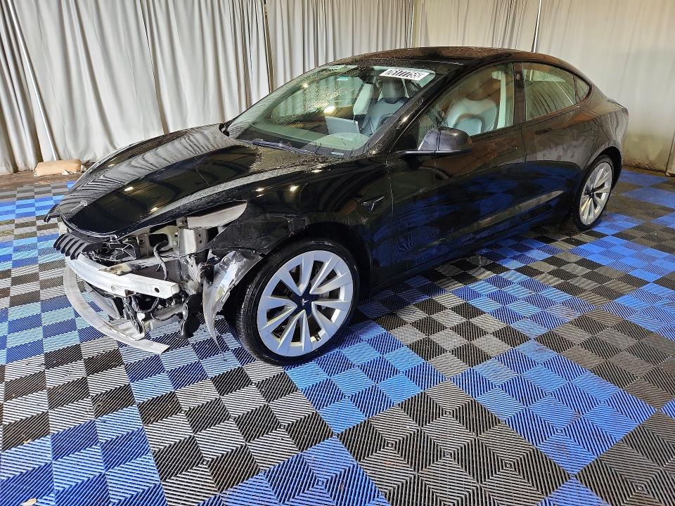 TESLA MODEL 3 2022 with VIN 5YJ3E1EA4NF288409 - Photo from auction
