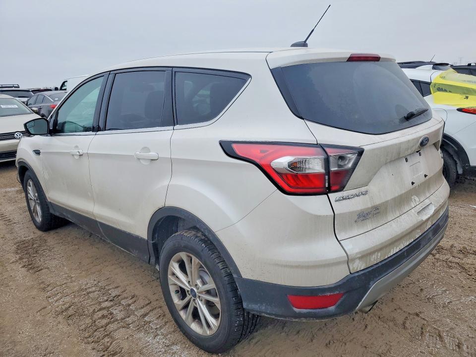 Photo 2 from auction – 2017 FORD ESCAPE with VIN 1FMCU9GD8HUE58870
