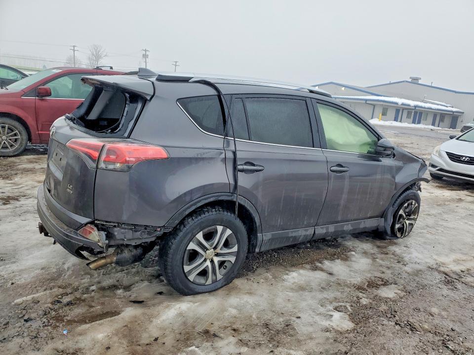Photo 3 from auction – 2016 TOYOTA RAV4 with VIN JTMBFREV0GJ067752