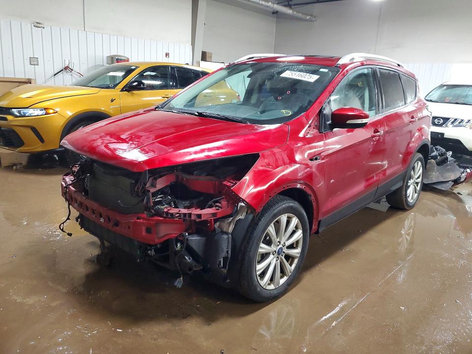 FORD ESCAPE TIT 2017 with VIN 1FMCU9JD6HUE31367 - Photo from auction