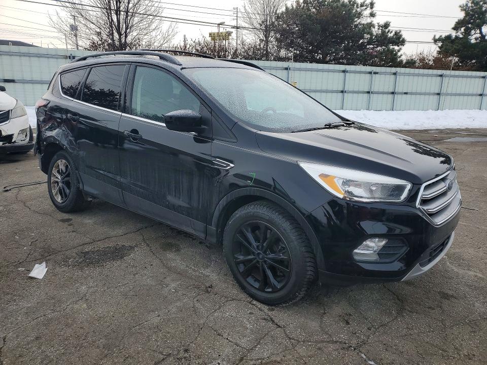 Photo 4 from auction – 2017 FORD ESCAPE SE with VIN 1FMCU9GD3HUE70795