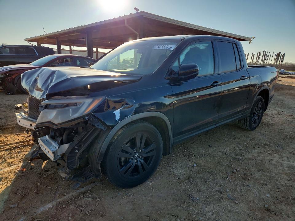 HONDA RIDGELINE 2017 with VIN 5FPYK2F1XHB002545 - Photo from auction