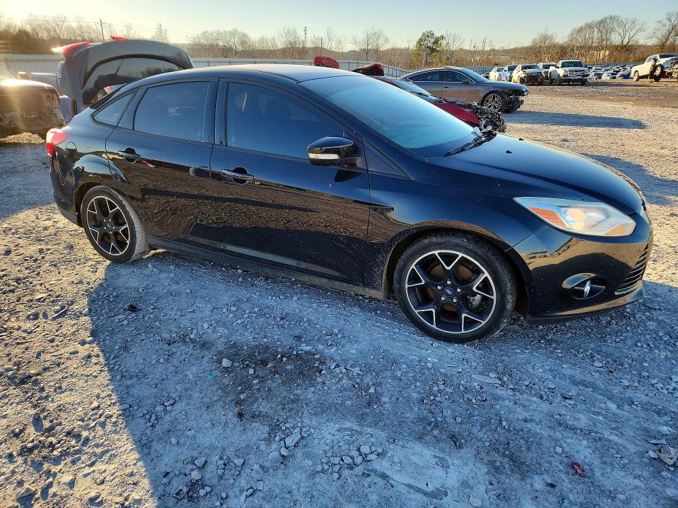 Photo 4 from auction – 2014 FORD FOCUS with VIN 1FADP3F29EL179738