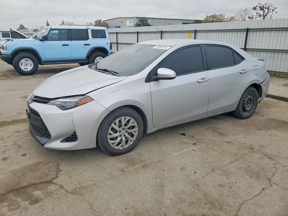 TOYOTA COROLLA 2018 with VIN 2T1BURHE9JC028534 - Photo from auction