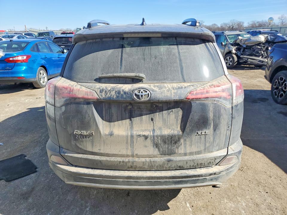 Photo 6 from auction – 2018 TOYOTA RAV4 with VIN 2T3WFREV7JW482237