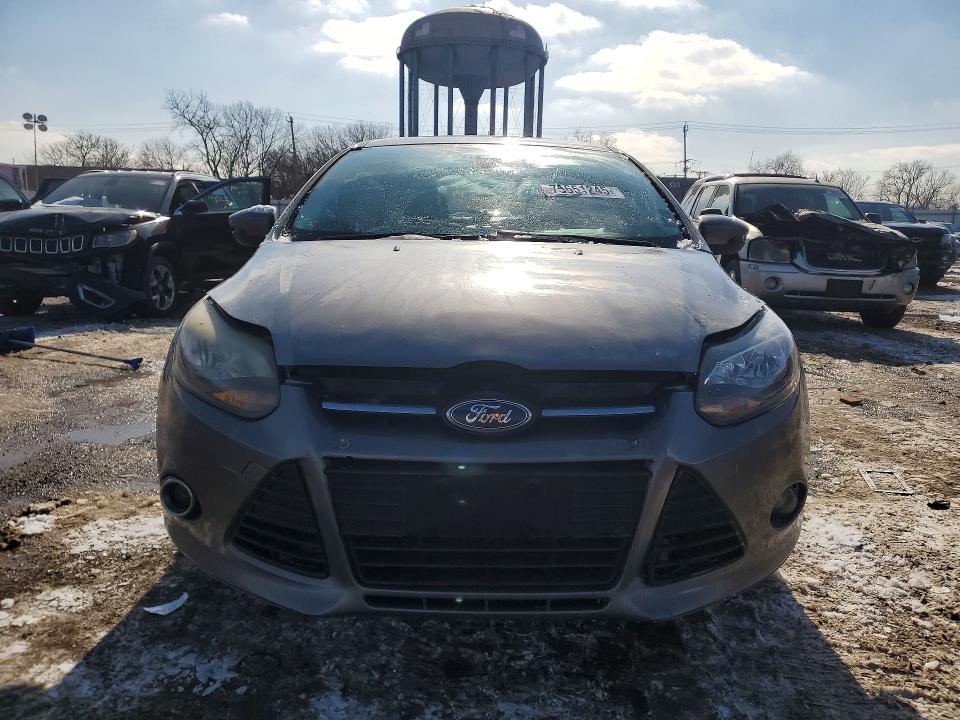 Photo 5 from auction – 2012 FORD FOCUS TITA with VIN 1FAHP3N21CL414228