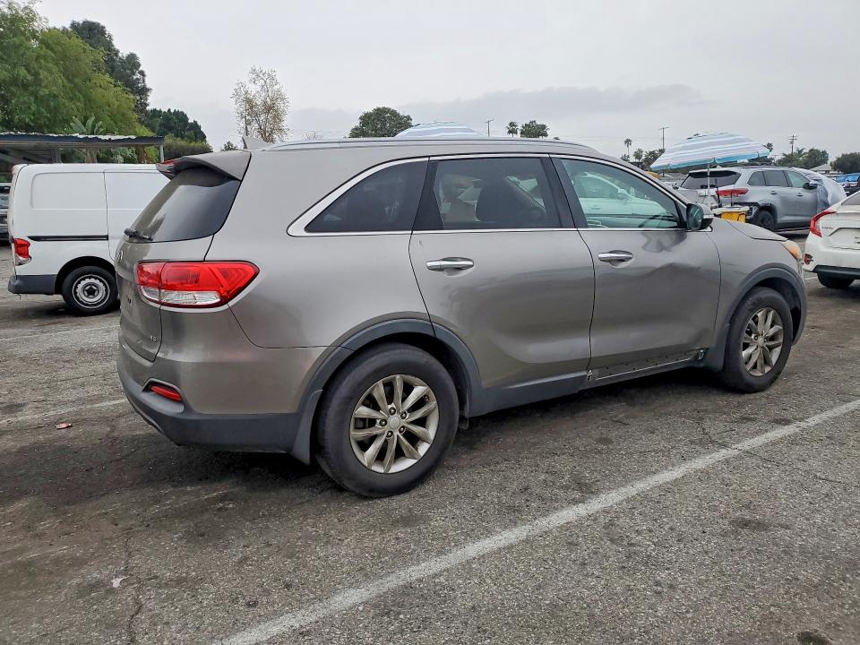 Photo 3 from auction – 2016 KIA SORENTO LX with VIN 5XYPG4A56GG077228