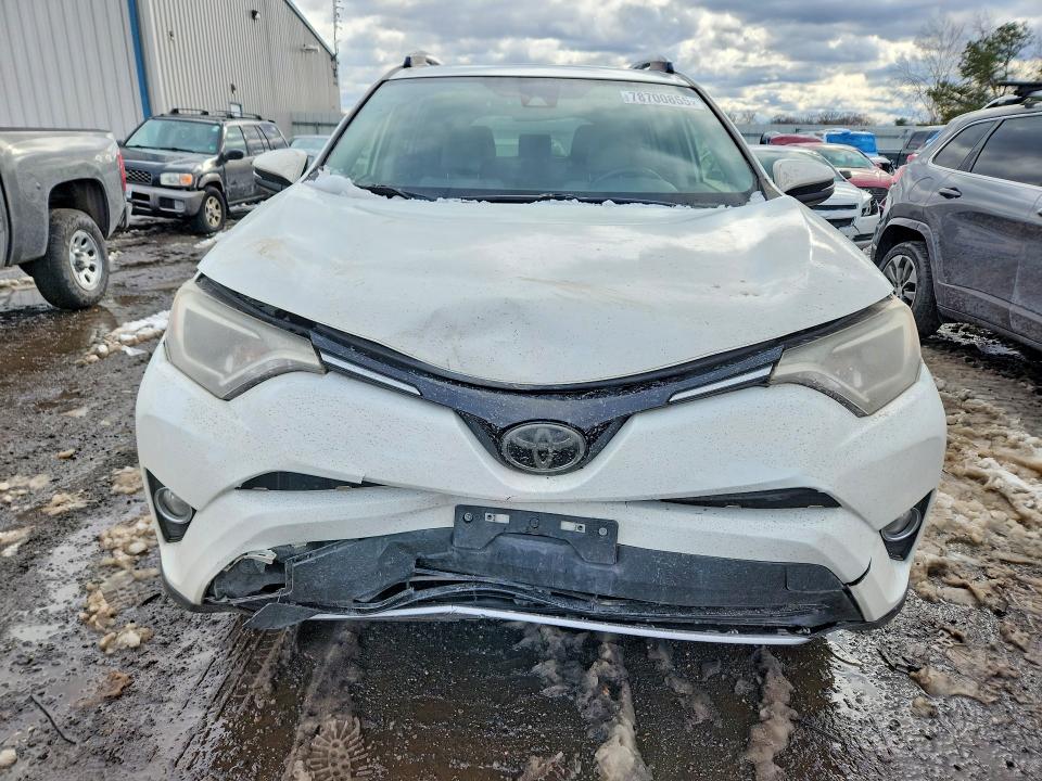 Photo 5 from auction – 2016 TOYOTA RAV4 with VIN JTMWFREV4JJ726439