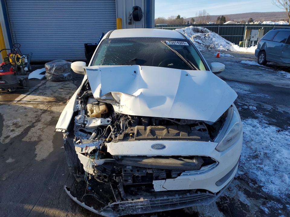 Photo 5 from auction – 2016 FORD FOCUS with VIN 1FADP3K29GL255239