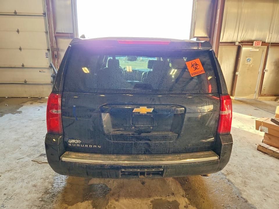 Photo 6 from auction – 2015 CHEVROLET SUBURBAN with VIN 1GNSKKKCXFR258172