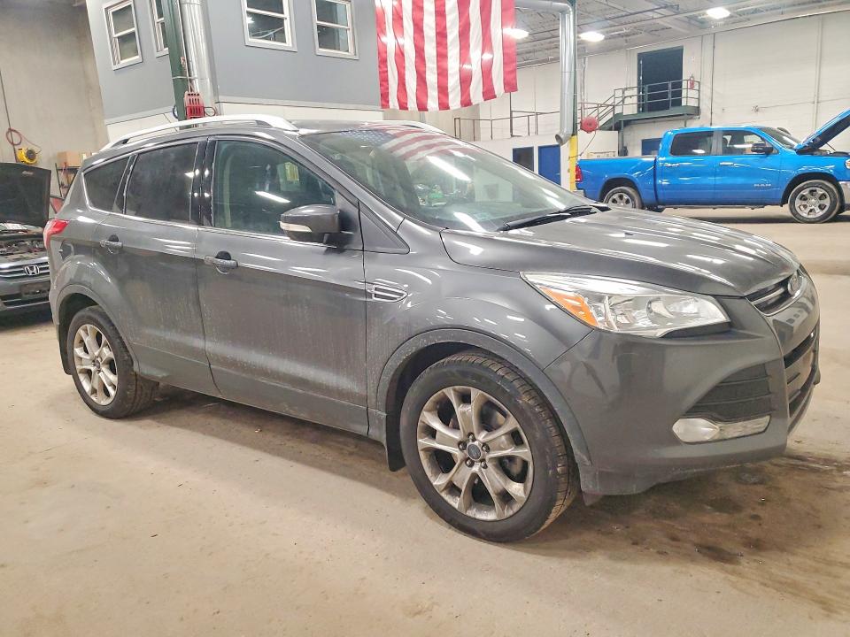 Photo 4 from auction – 2015 FORD ESCAPE TIT with VIN 1FMCU9JX7FUB62707