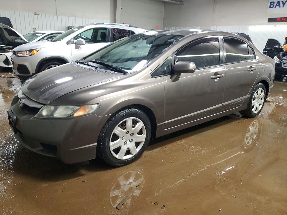 HONDA CIVIC LX 2011 with VIN 2HGFA1F5XBH511750 - Photo from auction