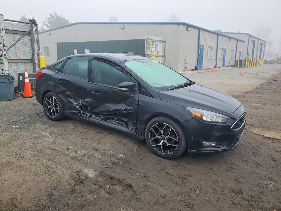Photo 4 from auction – 2018 FORD FOCUS with VIN 1FADP3H28JL292250