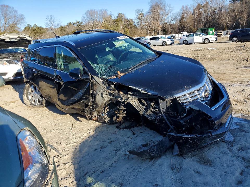 Photo 4 from auction – 2013 CADILLAC SRX with VIN 3GYFNCE39DS650034