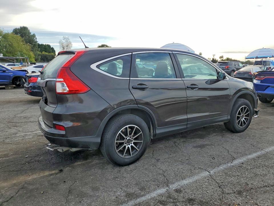 Photo 3 from auction – 2015 HONDA CR-V LX with VIN 2HKRM3H33FH547142